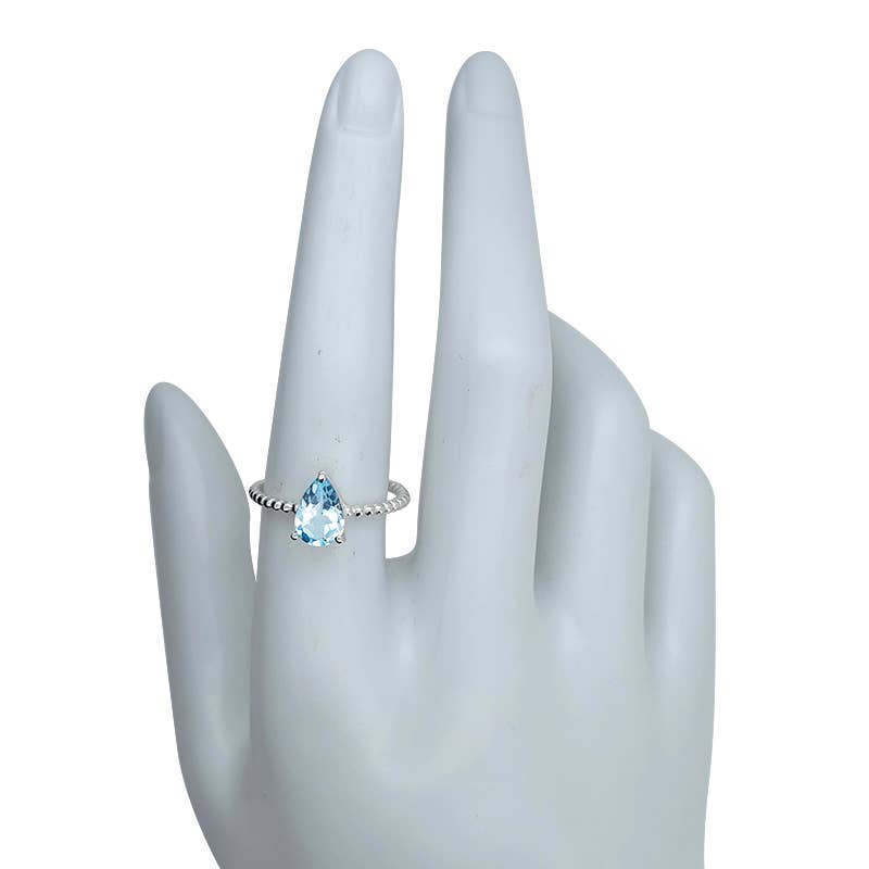 Faceted Blue Topaz Ring: 7
